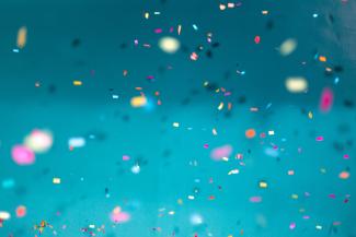 selective focus photography of multicolored confetti lot by Jason Leung courtesy of Unsplash.