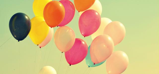 assorted-color balloons on air by Sagar Patil courtesy of Unsplash.